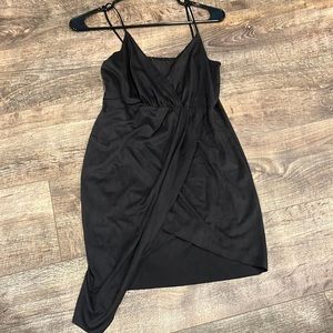Black mini dress. Cross front. Spaghetti straps. Size:4